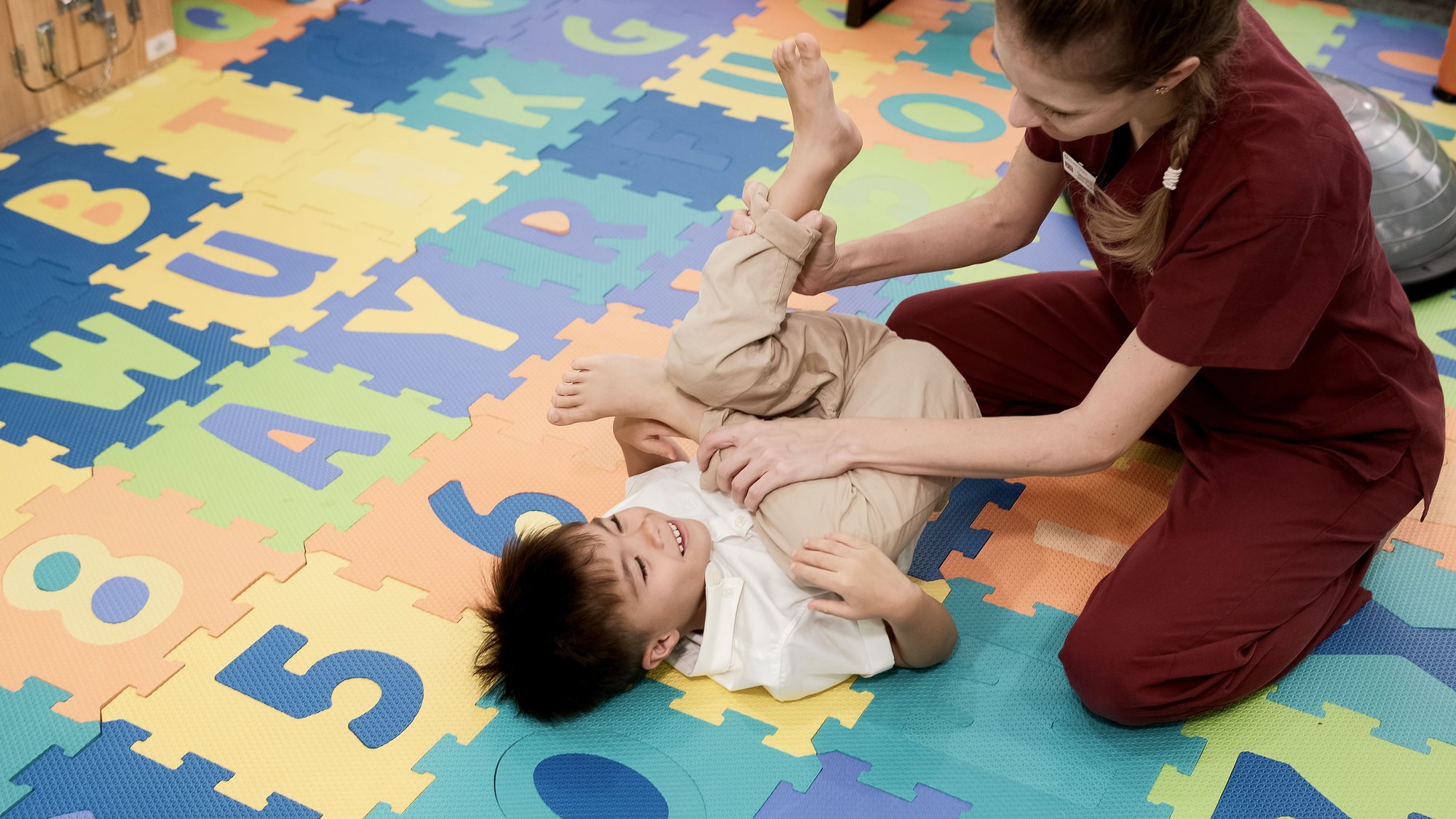 Georgina-Assessing-Children-Feet (1)