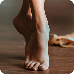 Pain increased when walking barefoot or on hard surfaces