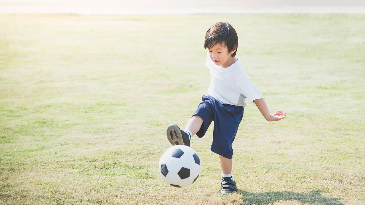 growing-pain-kid-play-soccer-image