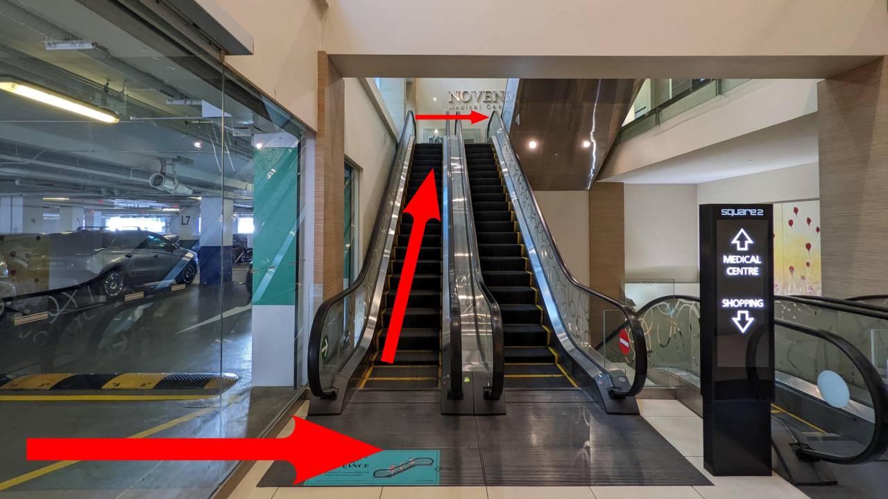 Go up the escalator and when you arrive at the top, you will be on the 8th floor. Turn right
